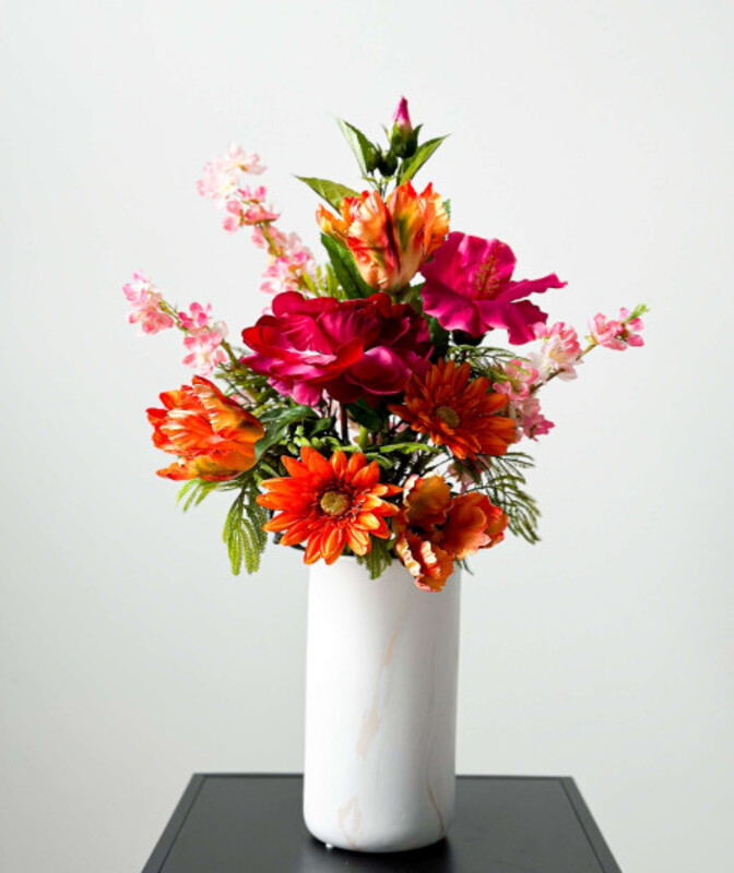 Artificial bouquet with varied colours and species