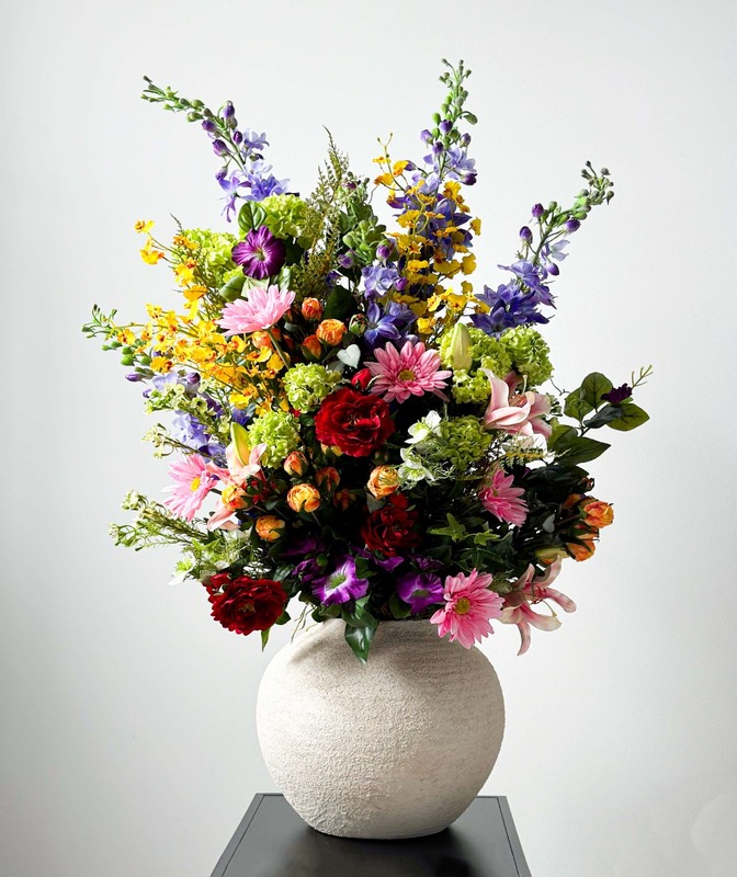 Colorful rich bouquet made of artificial plants