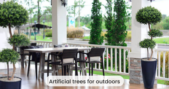 Artificial trees and plants placed in outdoor environment